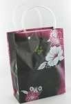 B&aelig;repose / Gavepose Sort/Rosa/Hvit Blomst Medium (12 stk.)